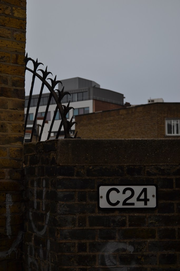 A railway bridge and old iron grating in King's Cross
